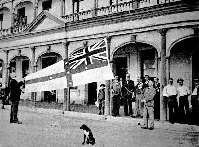 A view of a flag being raised in Townsville, 1899.